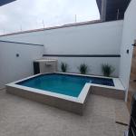 CAS261374 Casa em Condomínio Fechado à Venda em Itanhaém – Frente Mar com Piscina