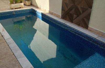 CAS261390 Sobrado em Condomínio em Itanhaém – 02 Suítes Planejadas com Piscina